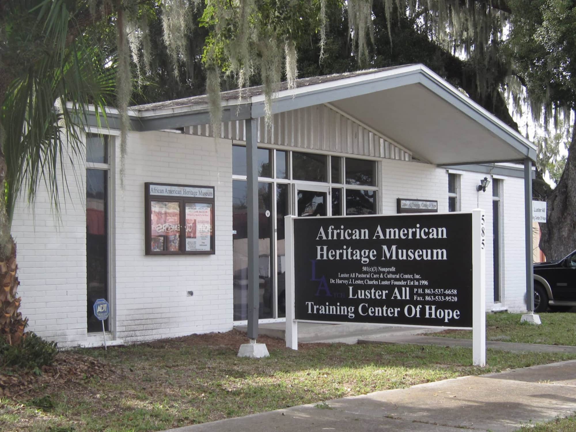 Exterior of entrance and sign at African American Heritage Museum and Luster All Training Center of Hope in Bartow, FL