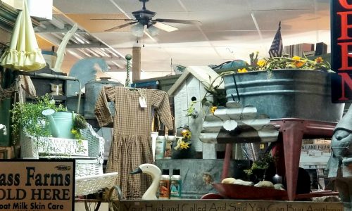 housewares, signs, antiques and a dress at Country Primitives Vintage in Winter Haven, FL