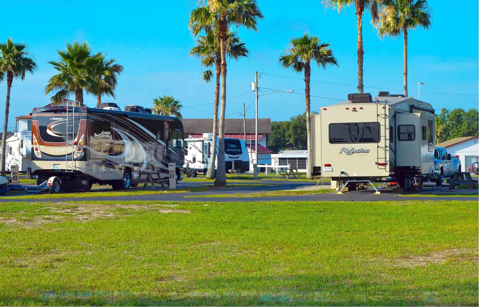 RVs parked in sites at East Haven RV Park in Winter Haven