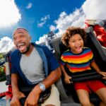 father and son on Great LEGO Race roller coaster at LEGOLAND in Winter Haven, FL