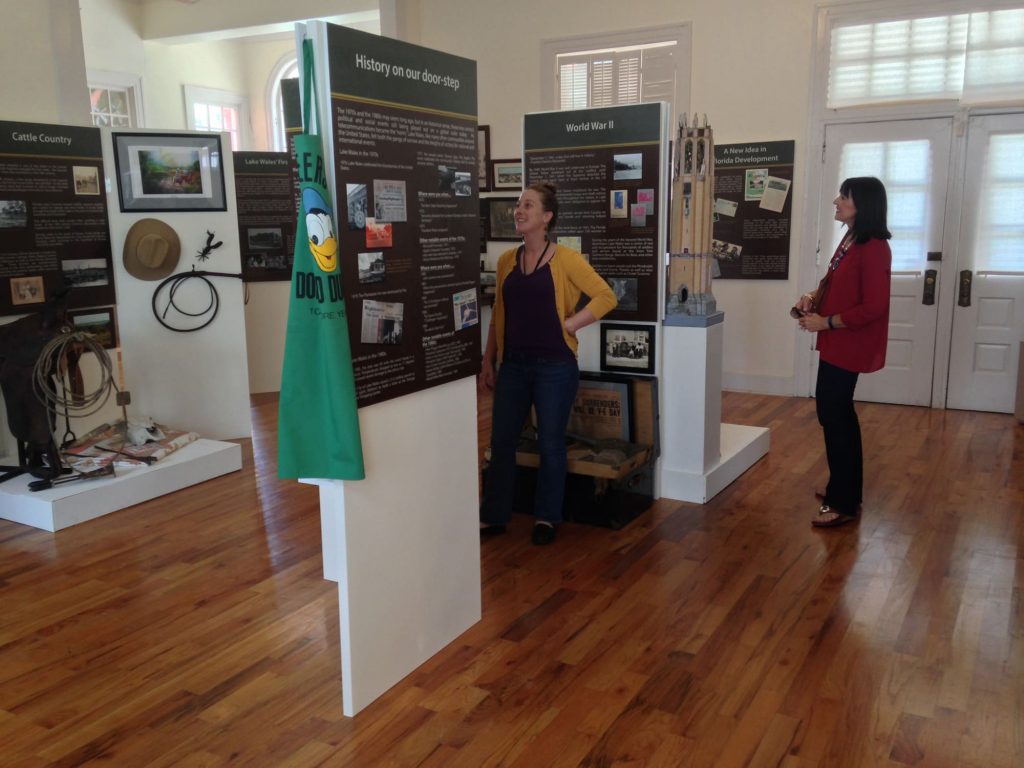 2 females looking at exhibits inside Lake Wales History Museum