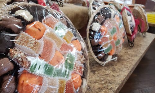 Chocolate and colorful candy sampler baskets at Webb's Candy Shop in Davenport, FL