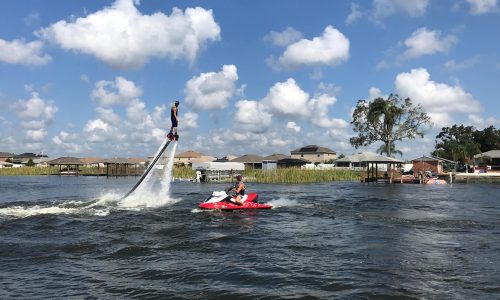 man flyboarding with jet ski tow on lake at Winter Haven Watersports