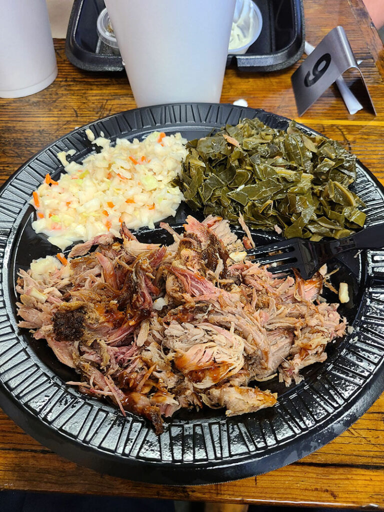 Pulled pork plate with collard greens and sweet cole slaw at Blackburn's BBQ in Eagle Lake