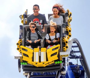 Family on roller coaster at LEGOLAND Florida Resort in Winter Haven, FL. Discount tickets to local attractions can be purchased through our Visitor Services department.