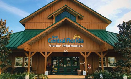 exterior of Polk County's Welcome Center in Davenport, FL. Visit Central Florida logo on front of building. This location is our main Visitor Services location.