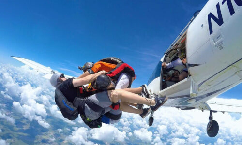 3 jumpers coming out of plane, mid air, at Jump Florida Skydive in Lake Wales, FL