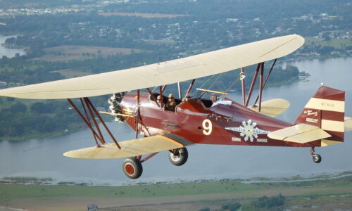 Standard D-25 in flight during biplane ride at Waldo Wright's Flying Service in Central Florida