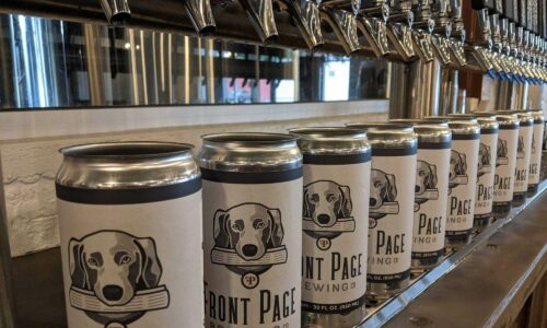 Front Page Brewing Co crowlers lined up under taps