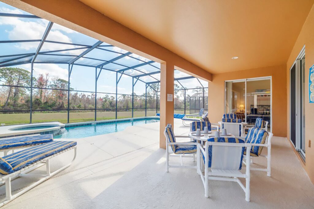 patio and pool area at Alpha Vacations rental in Davenport
