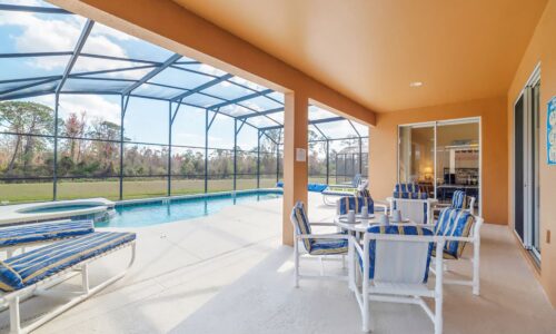 patio and pool area at Alpha Vacations rental in Davenport
