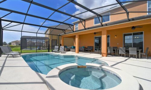 Pool and hot tub area of two story vacation rental home managed by An Owners Dream Management in Davenport