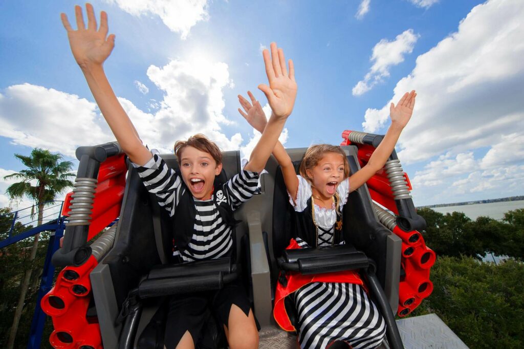 2 kids on roller coaster during LEGOLAND Florida Piratefest Weekend