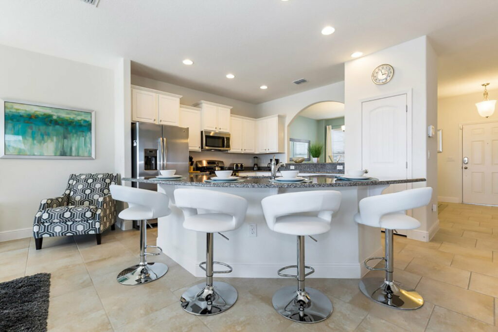kitchen and breakfast bar area of Orlando Holiday Management home in Davenport