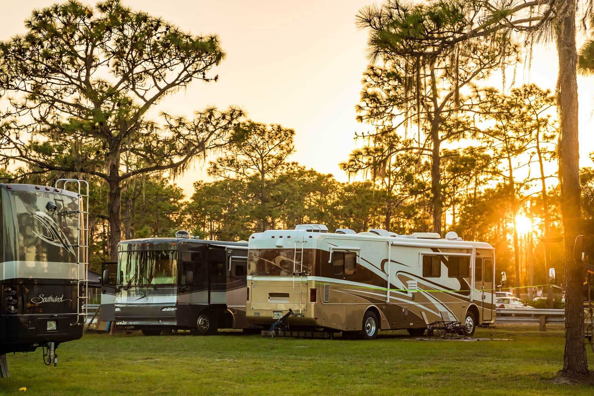 Resort at Canopy Oaks in Lake Wales, FL pre construction image showing RVs on grass under trees