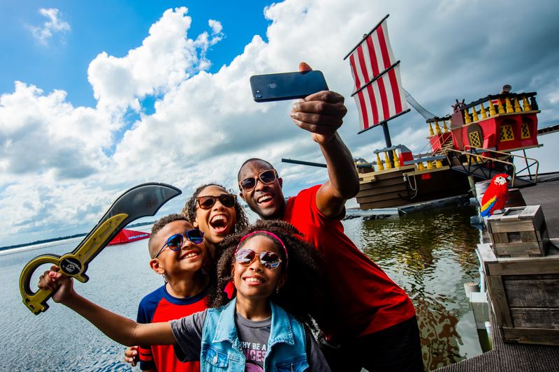 Family taking selfie at the lagoon during LEGOLAND Piratefest Weekend