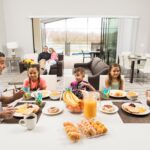 Family at breakfast in Balmoral vacation rental