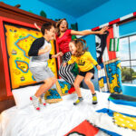 Kids jumping on the bed at LEGOLAND Pirate Island Hotel