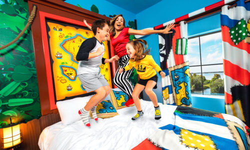 Kids jumping on the bed at LEGOLAND Pirate Island Hotel