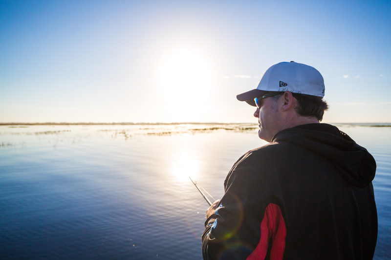 Angler on Lake Kissimmee at sunrise