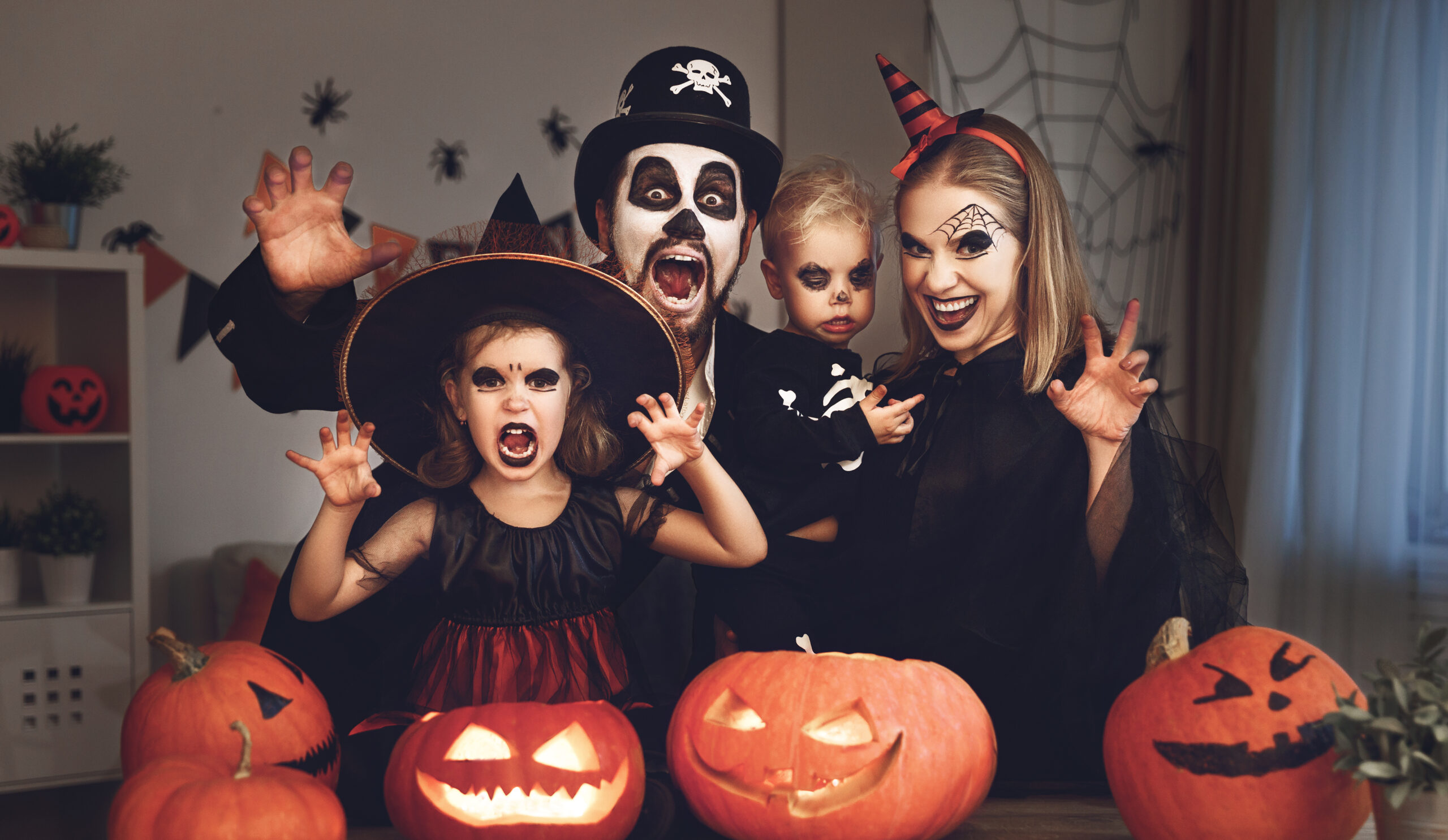 Family of four in Halloween costumes for Balmoral Halloween Costume Party