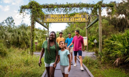 family hiking at circle b bar reserve