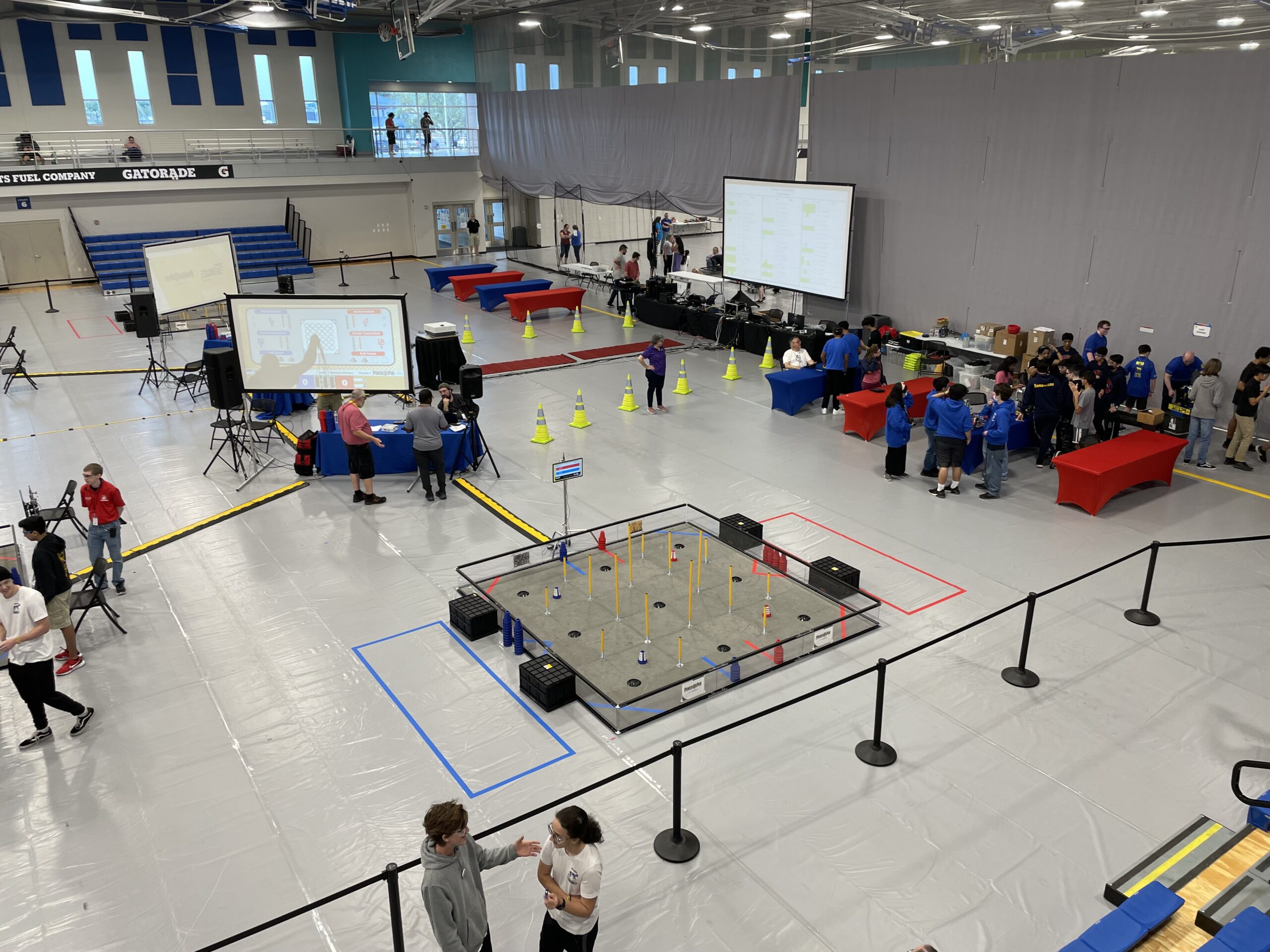 Kids set up at the First Tech Robotics Competition held at the AdventHealth Fieldhouse in Winter Haven