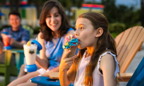 Girl and mom eating ice cream at Camp Margaritaville