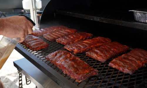 Ribs on the grill at Pitmasters in Paradise