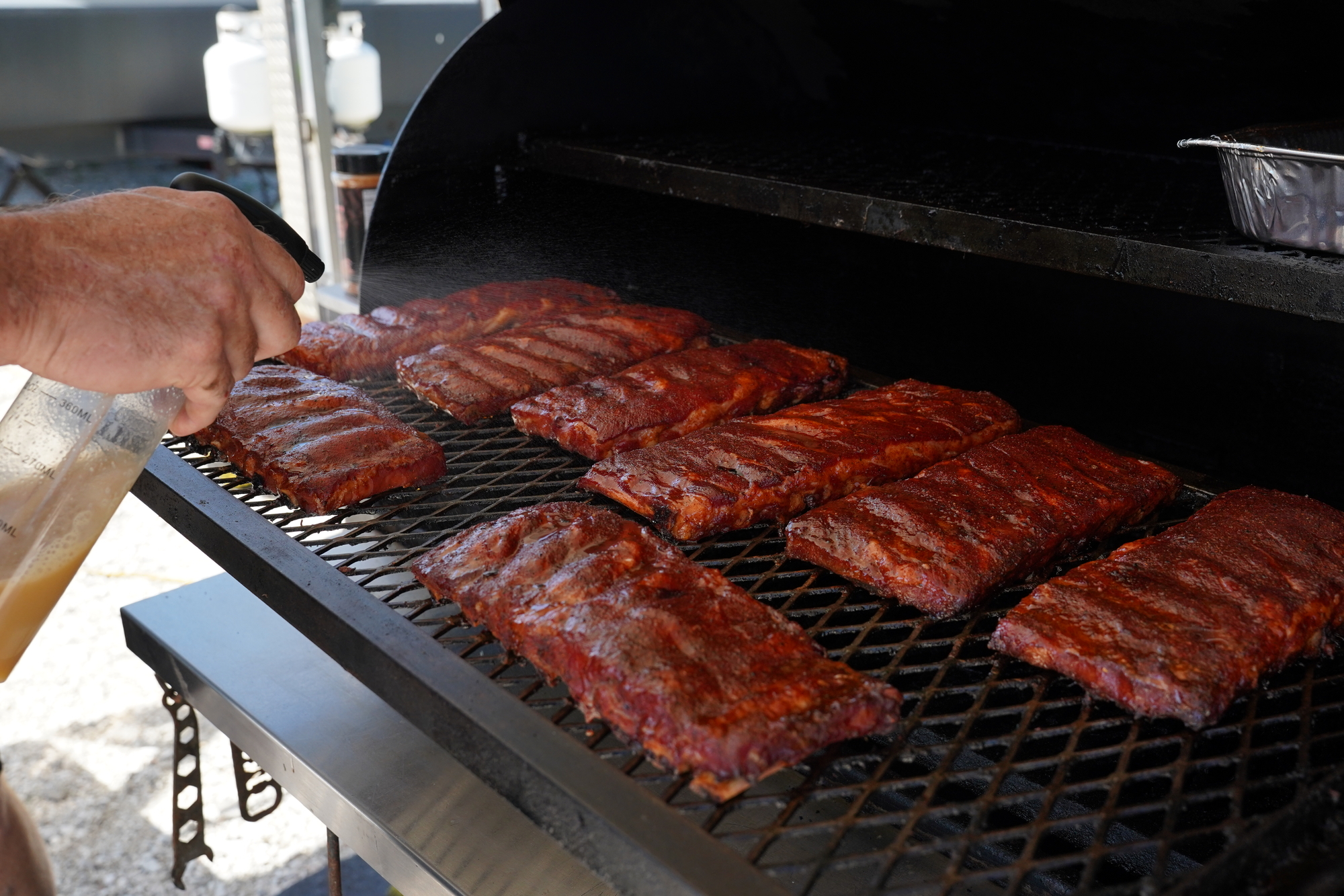 Ribs on the grill at Pitmasters in Paradise
